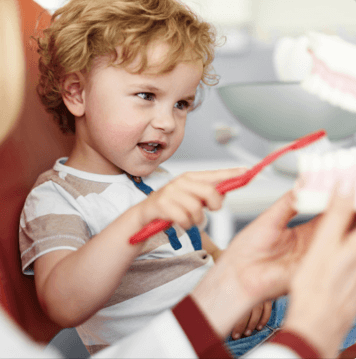 Little boy with toothbrush