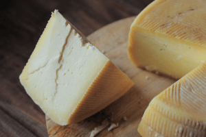 closeup of a cheese wheel