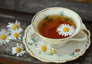 closeup of tea with a flower in it