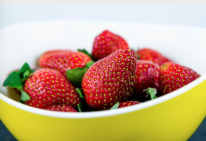 strawberries in a yellow bowl