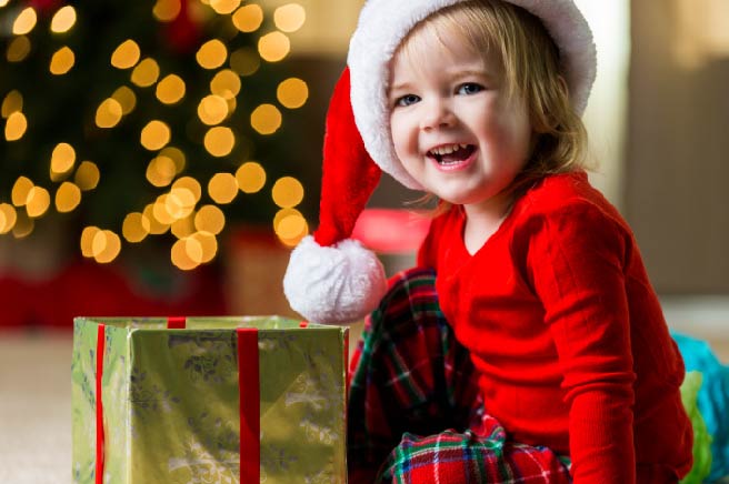 young girl with holiday gift