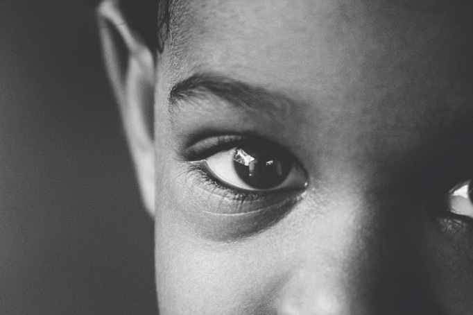 black and white close up of toddler boy