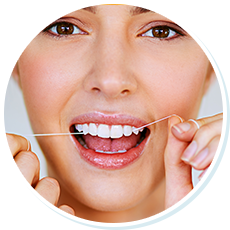 woman flossing her bright, white teeth