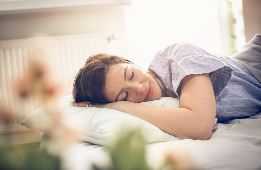 woman resting after tooth extraction