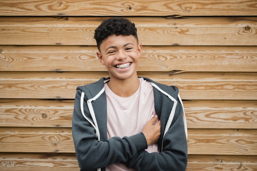 teenage boy with braces after orthodontic consultation