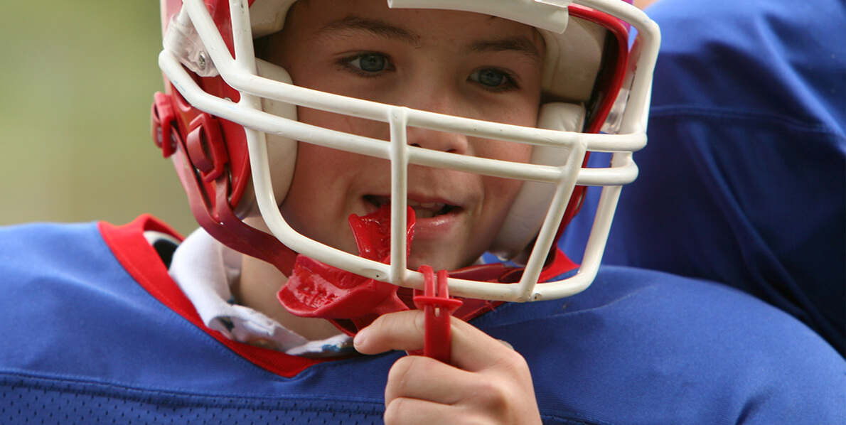 hero-kids-custom-mouthguards Mother with her sons